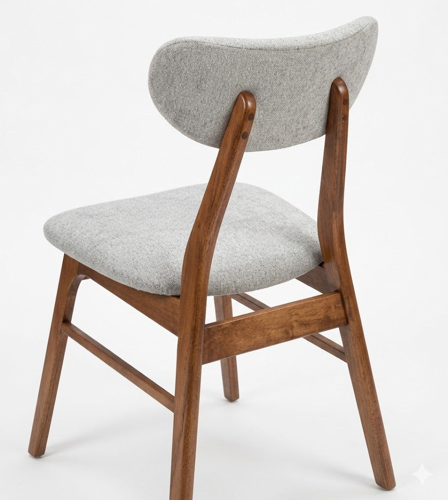 Silla Palermo: diseño moderno en madera de nogal y tela gris. Ergonómica, elegante y de alta durabilidad.