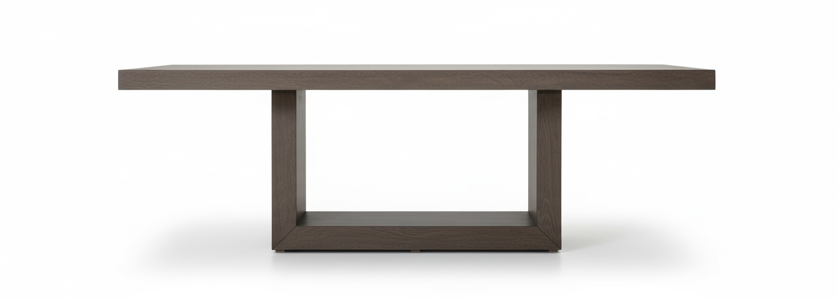 Mesa Soho: diseño minimalista y robusto con estructura sólida en madera de tono oscuro. Acabado premium, gran funcionalidad y elegancia atemporal para transformar tu comedor."
