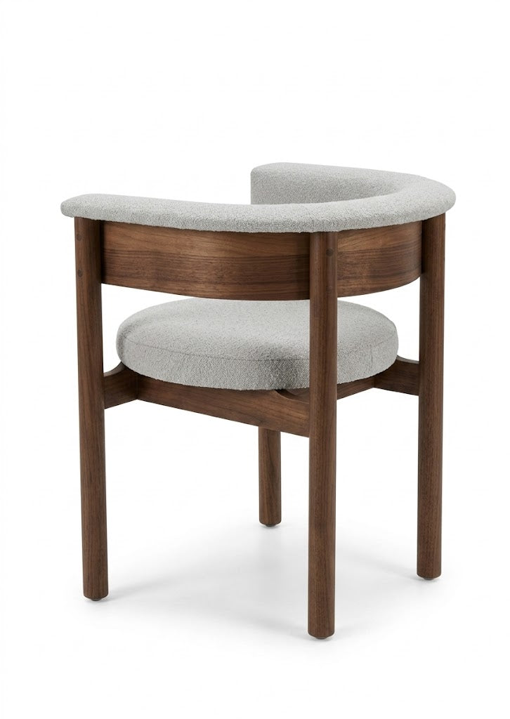 Silla Boden: diseño moderno con estructura en madera sólida y tapizado premium. Confort ergonómico, estilo contemporáneo y alta durabilidad para comedor o espacio de trabajo
